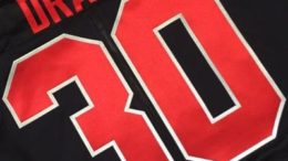 A close up of the number 3 0 on a jersey